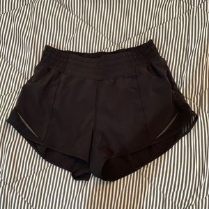 Gently used size 6 black lululemon high rise 2.5 inch inseam hotty hot shorts